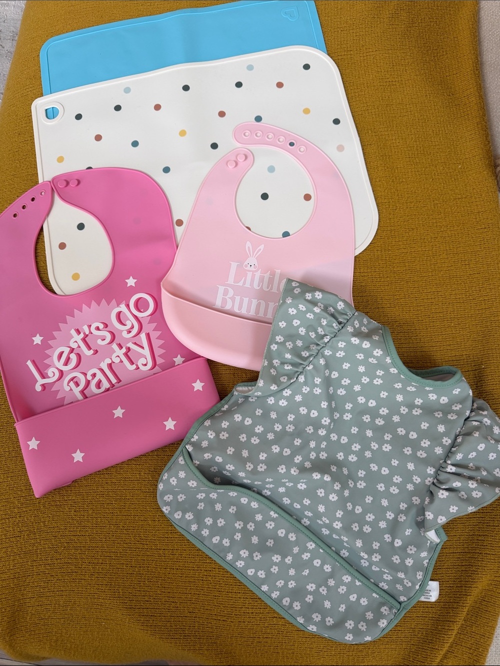 Girls assortment of bibs and placemats